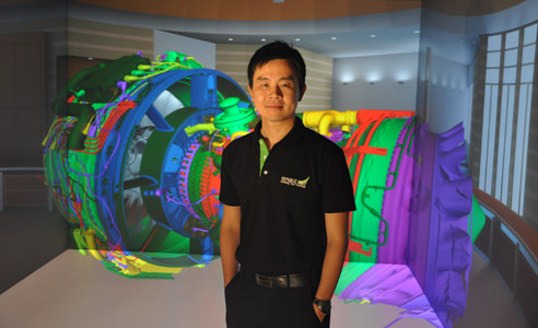Mr. Koh Chee Keat in front of the EON Icube